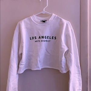 A long sleeve cropped Los Angeles graphic tee.